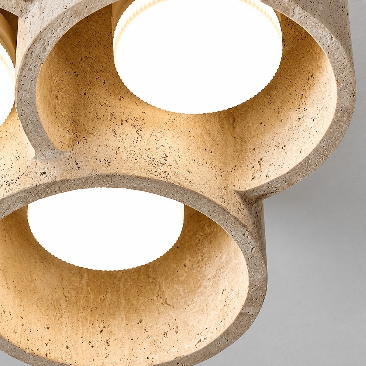 Lit travertine stone shade close detail