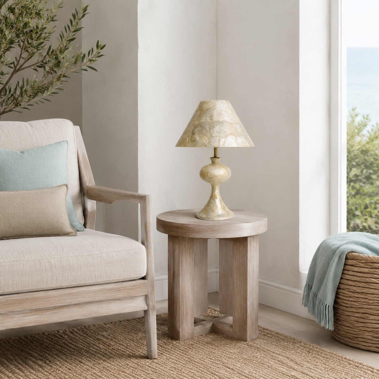 Capiz shell table lamp beside a chair in a coastal living room