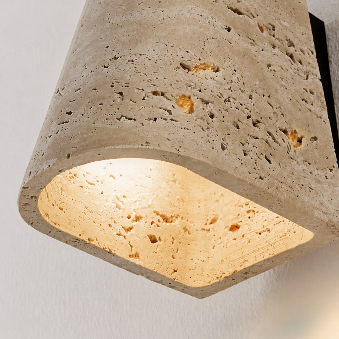Lower opening and softly illuminated travertine edge