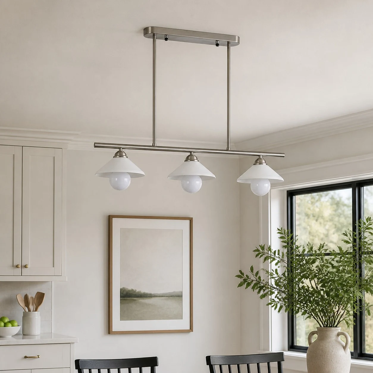 Three-head pendant above a calm dining space