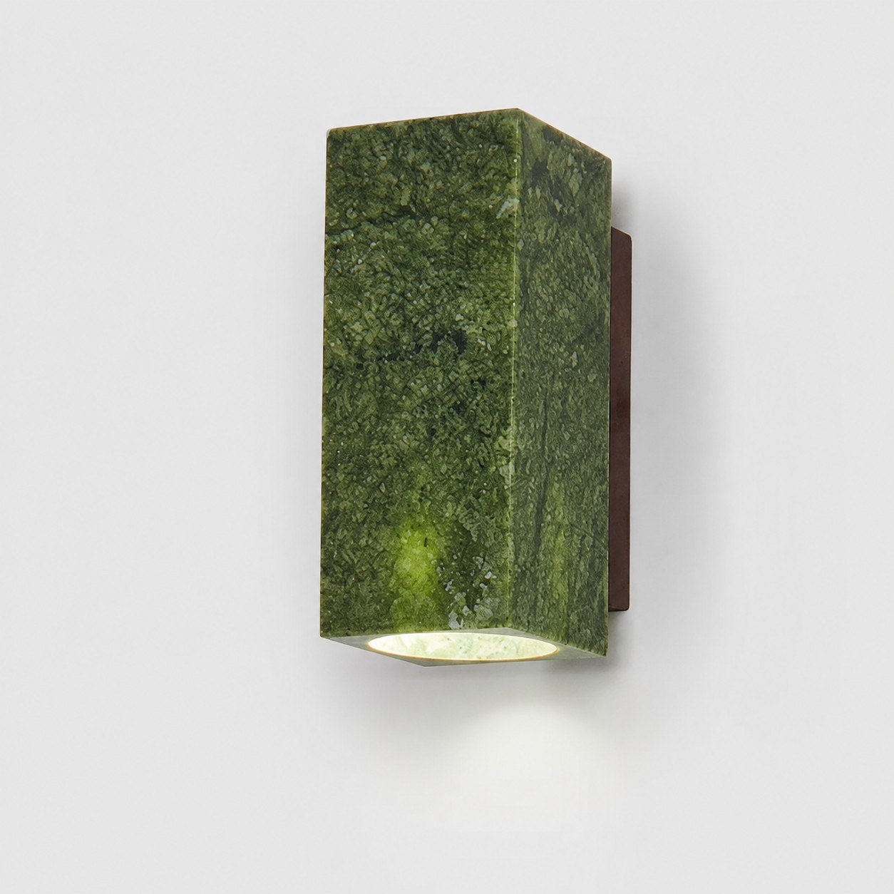 Green jade stone wall light on a clean white background