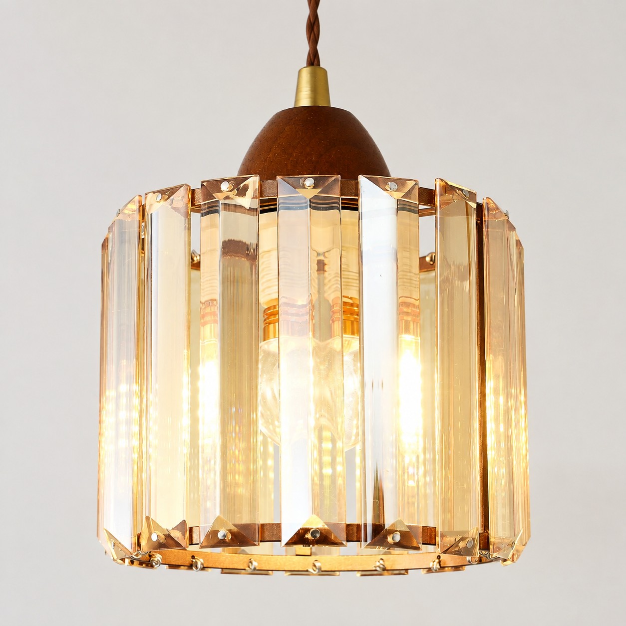 Faceted crystal shade and metal frame detail