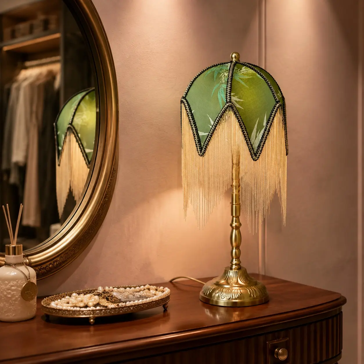 Vintage green tassel table lamp on a dressing table