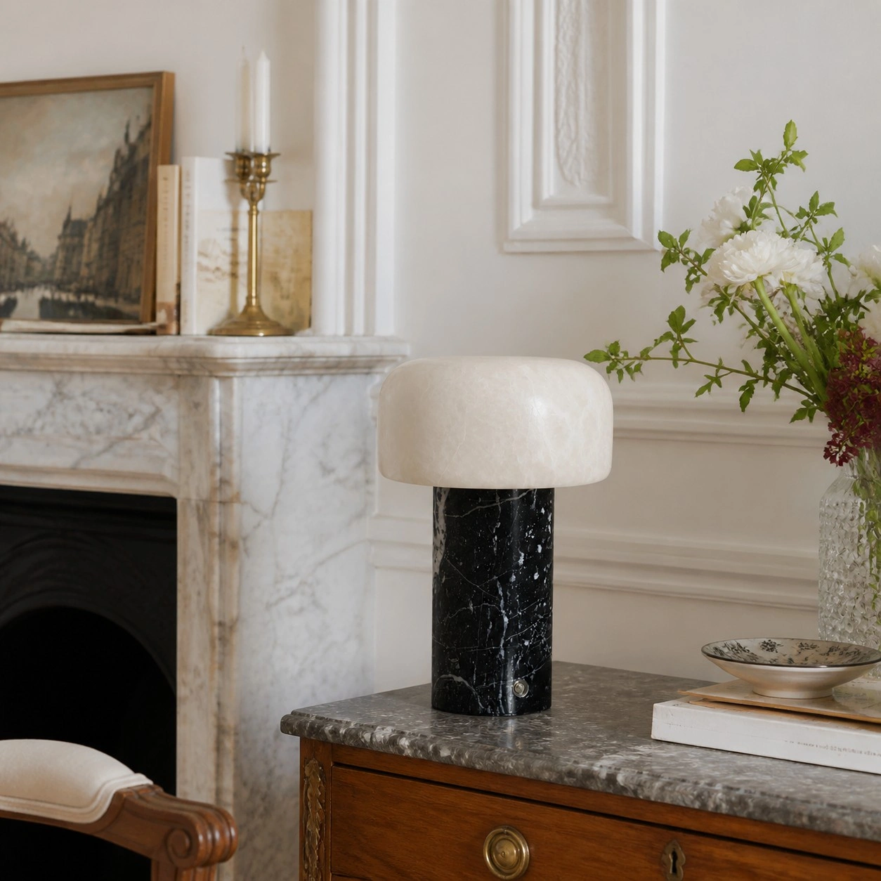 Dolomite and Bulgari Black Marble lamp on a console