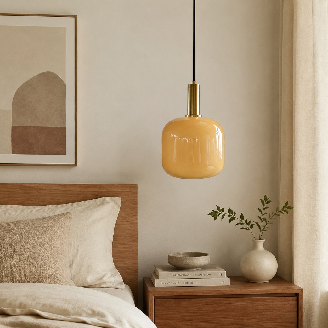 Yellow glass pendant light beside a neutral bedroom nightstand