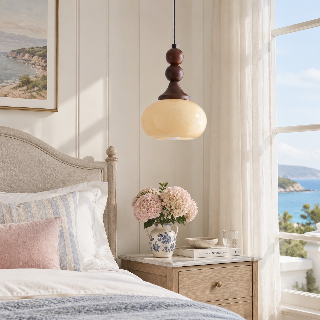 Cream glass pendant in a coastal bedroom
