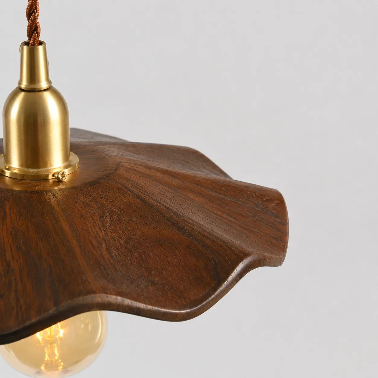 dark wood lotus pendant light wood grain detail